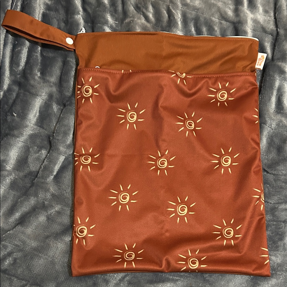 Rust Sun Print Wet Bag with Wrist Strap